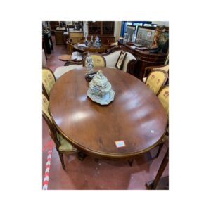 Mesa comedor ovalada nogal firma Valenti